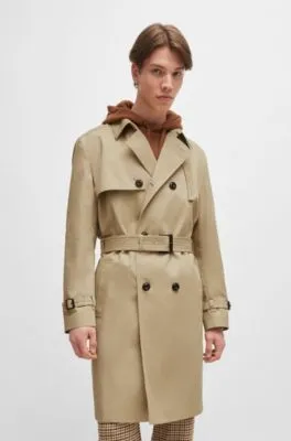 Water-repellent trench coat with buckled belt