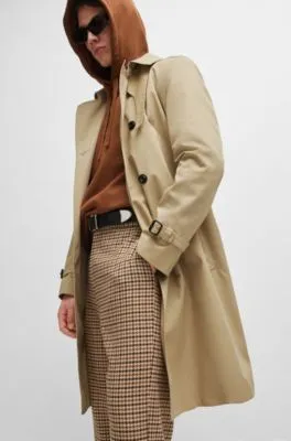 Water-repellent trench coat with buckled belt