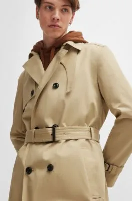 Water-repellent trench coat with buckled belt