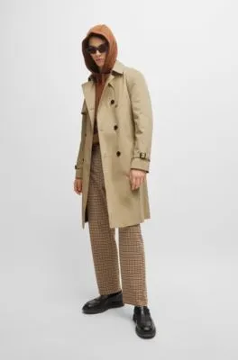 Water-repellent trench coat with buckled belt